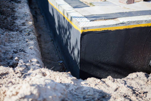 Professional Waterproofing technician working in Mount Olive, NC